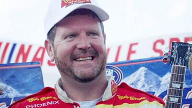 Driver Randy Lajoie celebrates after winning the sixth annual BellSouth Mobility 320 at the Nashville Motor Speedway on April 8, 2000.