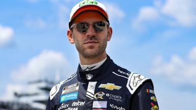 NASCAR Cup Series driver Daniel Suarez walks on pit road during practice and qualifying for The Great American Getaway 400 at Pocono Raceway.