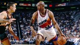Phoenix Suns forward Charles Barkley (34) is defended by Seattle Supersonics forward Detlef Schrempf (11) at America West Arena.