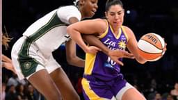 Los Angeles Sparks guard Kelsey Plum (10) drives to the basket defended by Seattle Storm forward Ezi Magbegor (13) during the second quarter at Crypto.com Arena.