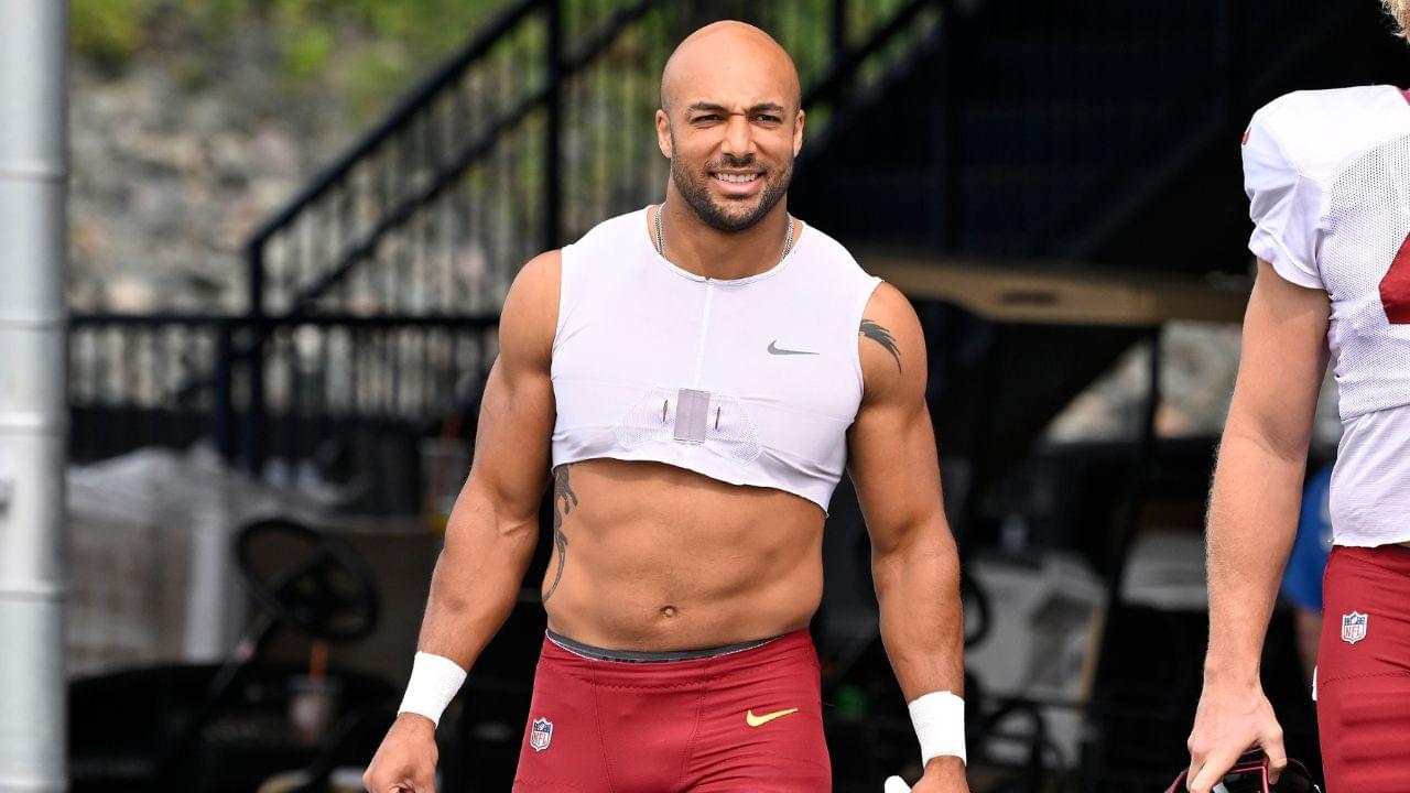 Washington Commanders running back Austin Ekeler (30) arrives at training camp at Gillette Stadium.