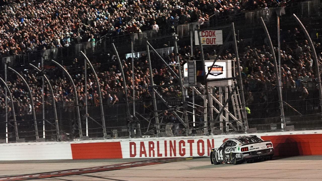 NASCAR Cup Series driver Chase Briscoe (14) crosses the start/finish line to win the Cook Out Southern 500 at Darlington Raceway.