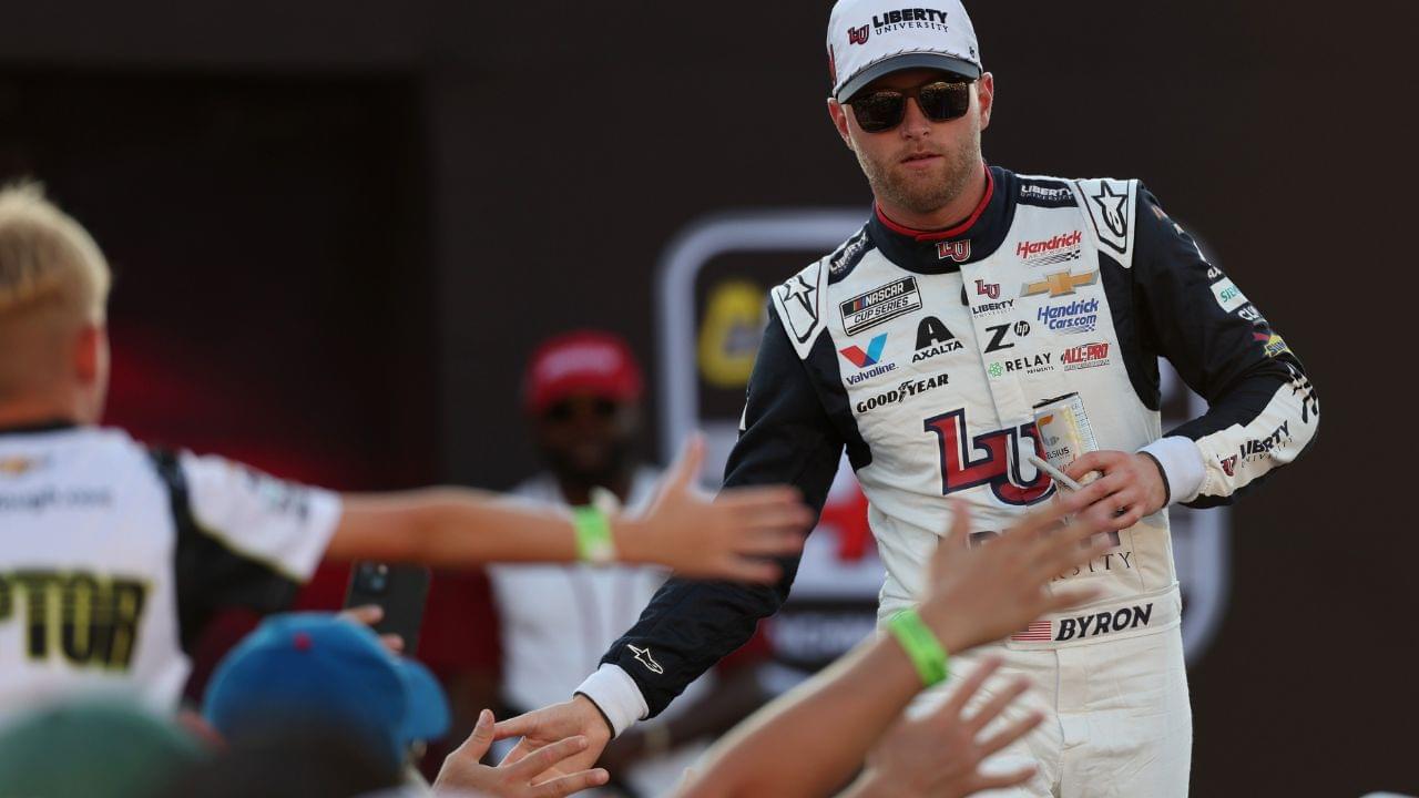 NASCAR Cup Series driver William Byron (24) shakes hands with fans during driver introductions prior to the NASCAR Cup Series Cook Out 400 at Richmond Raceway.