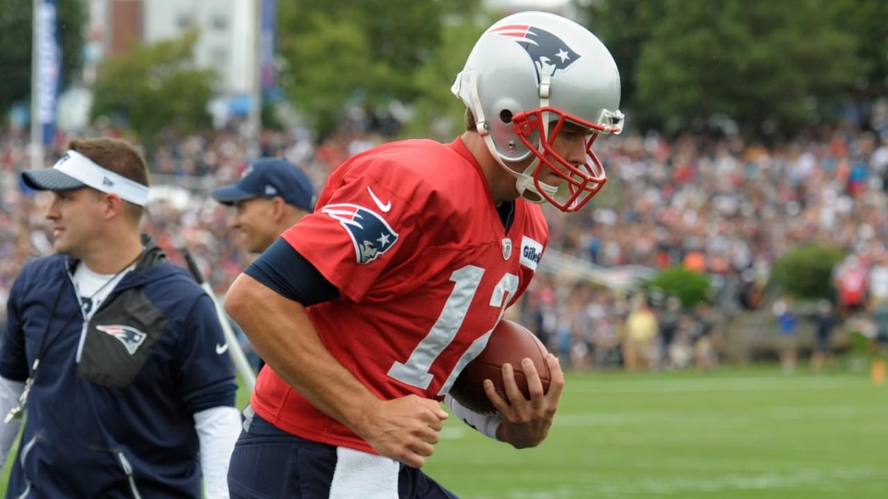 Jul 27, 2017; Foxborough, MA, USA; New England Patriots quarterback Tom Brady (12) runs through a drill during training camp at Gillette Stadium.