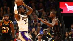 Nov 26, 2024; Phoenix, Arizona, USA; Los Angeles Lakers forward LeBron James (23) against Phoenix Suns forward Kevin Durant (35) during an NBA Cup game at Footprint Center.