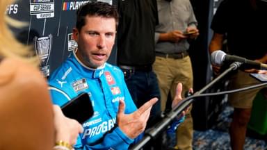 Denny Hamlin answers questions from the media during NASCAR Cup Series Playoff Media Day at Charlotte Convention Center.
