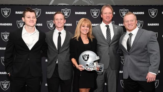 Jon Gruden and wife Cindy Gruden pose with sons Deuce Gruden, Michael Gruden and Jon Gruden III pose at press conference after being introduced as Oakland Raiders head coach at the Raiders headquarters.
