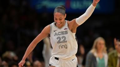 ; Las Vegas Aces center A'ja Wilson (22) celebrates after a 3 pointer during the second half against the Los Angeles Sparks at Crypto.com Arena.