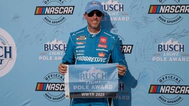 NASCAR Cup Series driver Denny Hamlin (11) poses for a photo after winning the pole award after practice and qualifying for the Enjoy Illinois 300 at World Wide Technology Raceway.