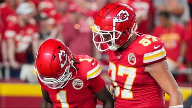 Kansas City Chiefs tight end Travis Kelce (87) celebrates with wide receiver Xavier Worthy (1) after a touchdown agains the Baltimore Ravens during the second half at GEHA Field at Arrowhead Stadium.