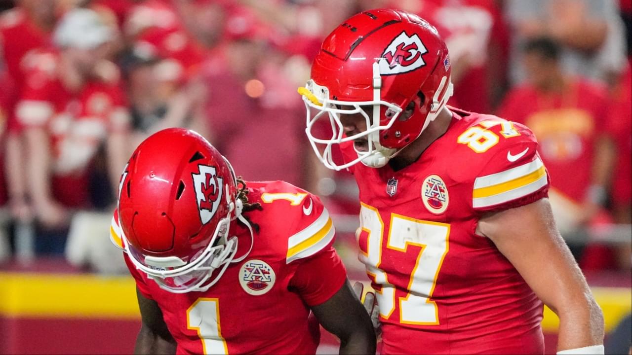 Kansas City Chiefs tight end Travis Kelce (87) celebrates with wide receiver Xavier Worthy (1) after a touchdown agains the Baltimore Ravens during the second half at GEHA Field at Arrowhead Stadium.