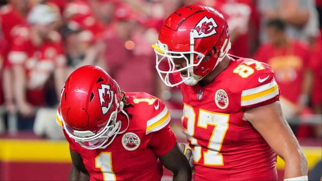 Kansas City Chiefs tight end Travis Kelce (87) celebrates with wide receiver Xavier Worthy (1) after a touchdown agains the Baltimore Ravens during the second half at GEHA Field at Arrowhead Stadium.