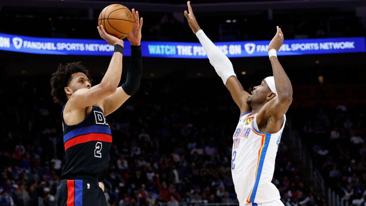 Detroit Pistons guard Cade Cunningham (2) shoots on Oklahoma City Thunder guard Shai Gilgeous-Alexander (2) in the first half at Little Caesars Arena.