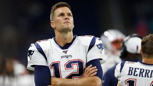 New England Patriots quarterback Tom Brady (12) looks up during the second half against the Detroit Lions at Ford Field.