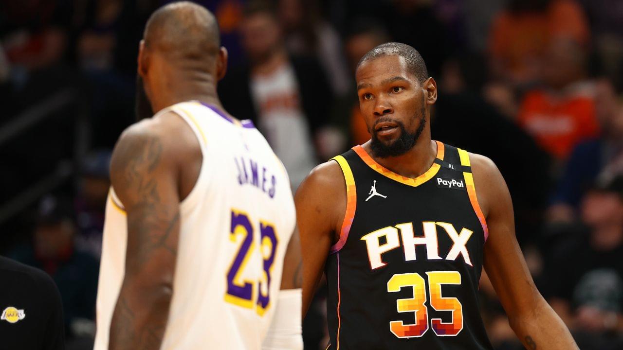 Phoenix Suns forward Kevin Durant (35) looks at Los Angeles Lakers forward LeBron James (23) during the third quarter at Footprint Center.