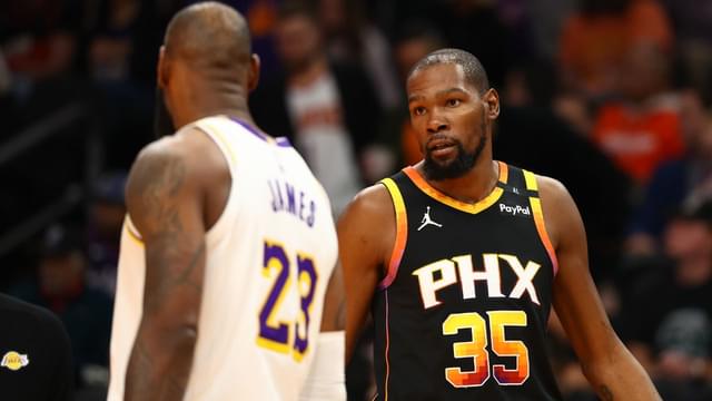 Phoenix Suns forward Kevin Durant (35) looks at Los Angeles Lakers forward LeBron James (23) during the third quarter at Footprint Center.