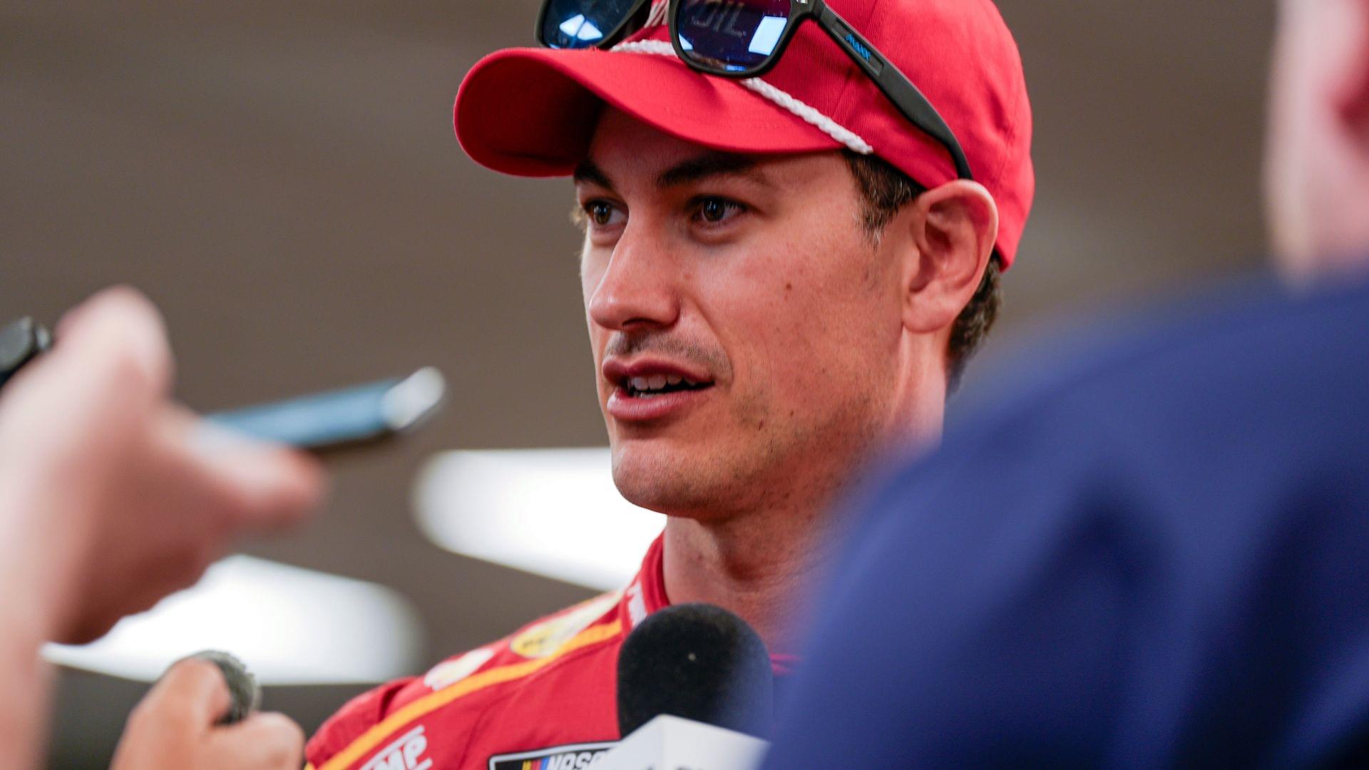 Apr 5, 2025; Darlington, South Carolina, USA; NASCAR Cup Series driver Joey Logano (22) talks with media at Darlington Raceway.