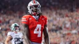 Ohio State Buckeyes wide receiver Jeremiah Smith (4) celebrates his touchdown during the second half against the Ohio Bobcats at Ohio Stadium.