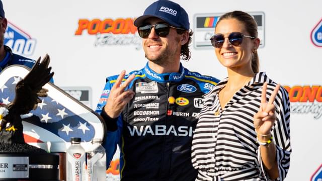 Team Penske's Ryan Blaney (12) poses with his fiancé Gianna Tulio on July 14, 2024