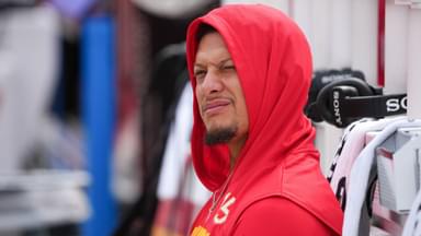 Kansas City Chiefs quarterback Patrick Mahomes (15) looks on during warmups prior to the game against the Philadelphia Eagles at GEHA Field at Arrowhead Stadium.