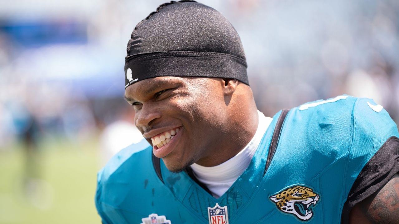 Jacksonville Jaguars wide receiver Travis Hunter (12) has a laugh while warming up before the start of an NFL football game between the Carolina Panthers at Jacksonville Jaguars at EverBank Stadium Sunday September 7, 2025. [Doug Engle/Florida Times-Union]