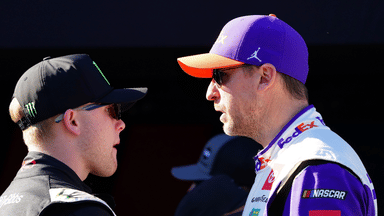 Feb 19, 2024; Daytona Beach, Florida, USA; NASCAR Cup Series driver Denny Hamlin (11) and driver Ty Gibbs (54) talk during driver introductions before the Daytona 500 at Daytona International Speedway. Mandatory Credit: John David Mercer-Imagn Images