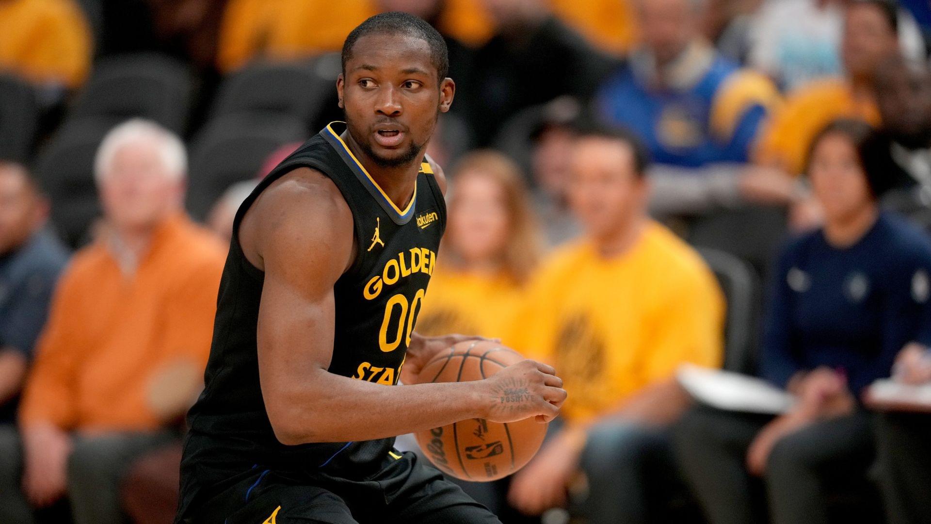 May 12, 2025; San Francisco, California, USA; Golden State Warriors forward Jonathan Kuminga (00) holds onto the ball against the Minnesota Timberwolves in the fourth quarter during game four of the second round for the 2025 NBA Playoffs at Chase Center.