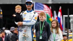 Kyle Larson with children Cooper Larson (left), Owen Larson (center) and Audrey Larson during the 109th Running of the Indianapolis 500 at Indianapolis Motor Speedway.