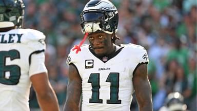 Philadelphia Eagles wide receiver AJ. Brown (11) and running back Saquon Barkley (26) during the fourth quarter against the Los Angeles Rams at Lincoln Financial Field.