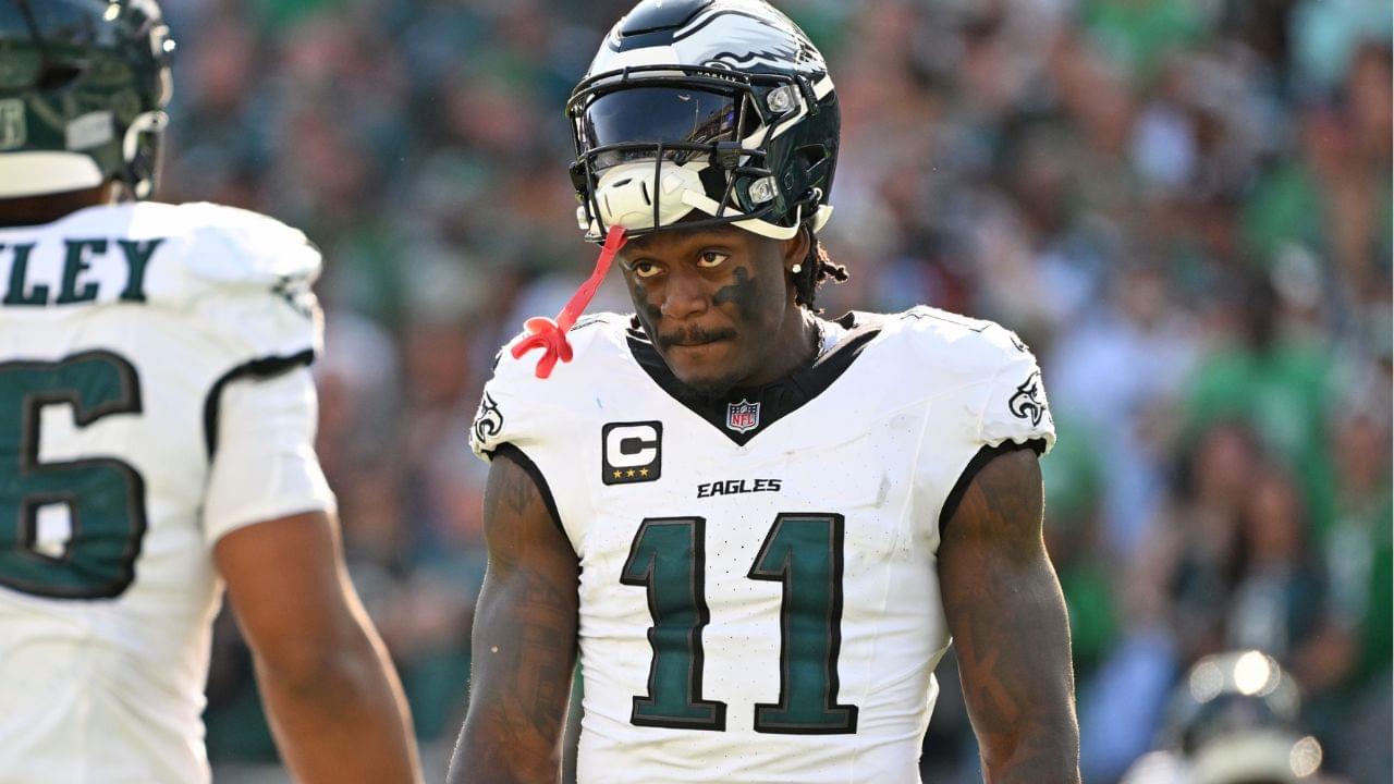 Philadelphia Eagles wide receiver AJ. Brown (11) and running back Saquon Barkley (26) during the fourth quarter against the Los Angeles Rams at Lincoln Financial Field.