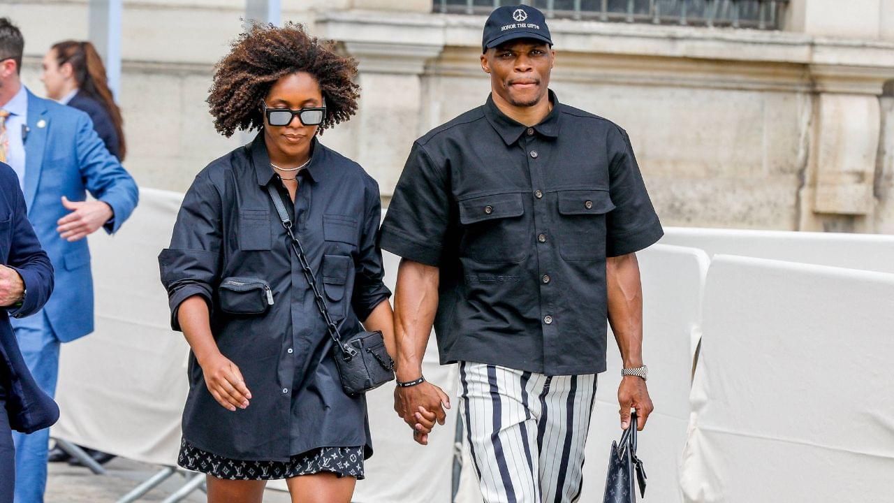 Russel Westbrook and his wife Nina Exiting the Mens Spring Summer 2023 Louis Vuitton fashion show at cour Carrée du Louvre in Paris, France