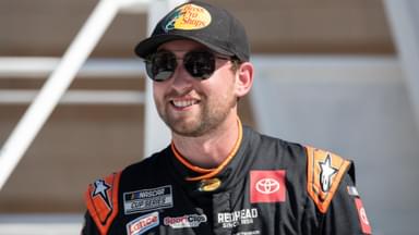 Sep 27, 2025; Kansas City, Kansas, USA; Chase Briscoe celebrates winning the starting pole position for the NASCAR Cup Series race at Kansas Speedway