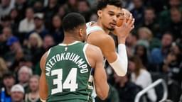 Jan 8, 2025; Milwaukee, Wisconsin, USA; San Antonio Spurs forward Victor Wembanyama (1) holds the ball away from Milwaukee Bucks forward Giannis Antetokounmpo (34) during the second quarter at Fiserv Forum.