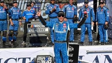 NASCAR Cup Series driver Denny Hamlin (11) poses for a photo after winning the Enjoy Illinois 300 at World Wide Technology Raceway.