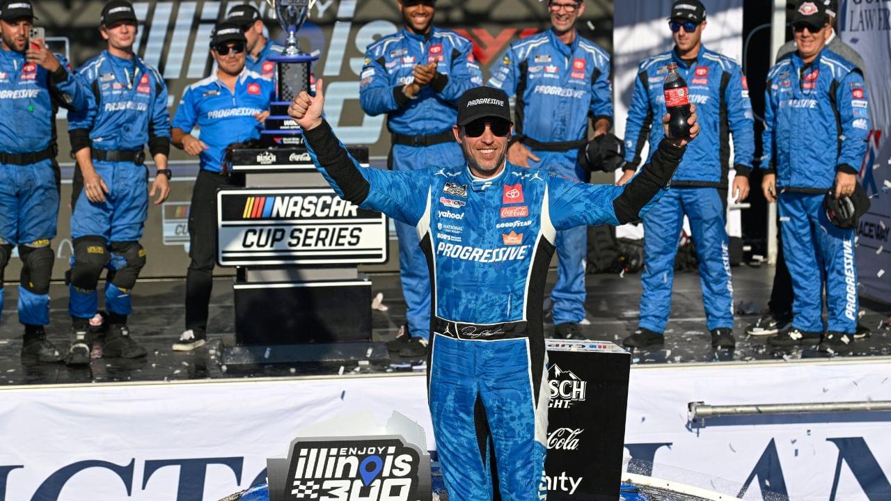 NASCAR Cup Series driver Denny Hamlin (11) poses for a photo after winning the Enjoy Illinois 300 at World Wide Technology Raceway.