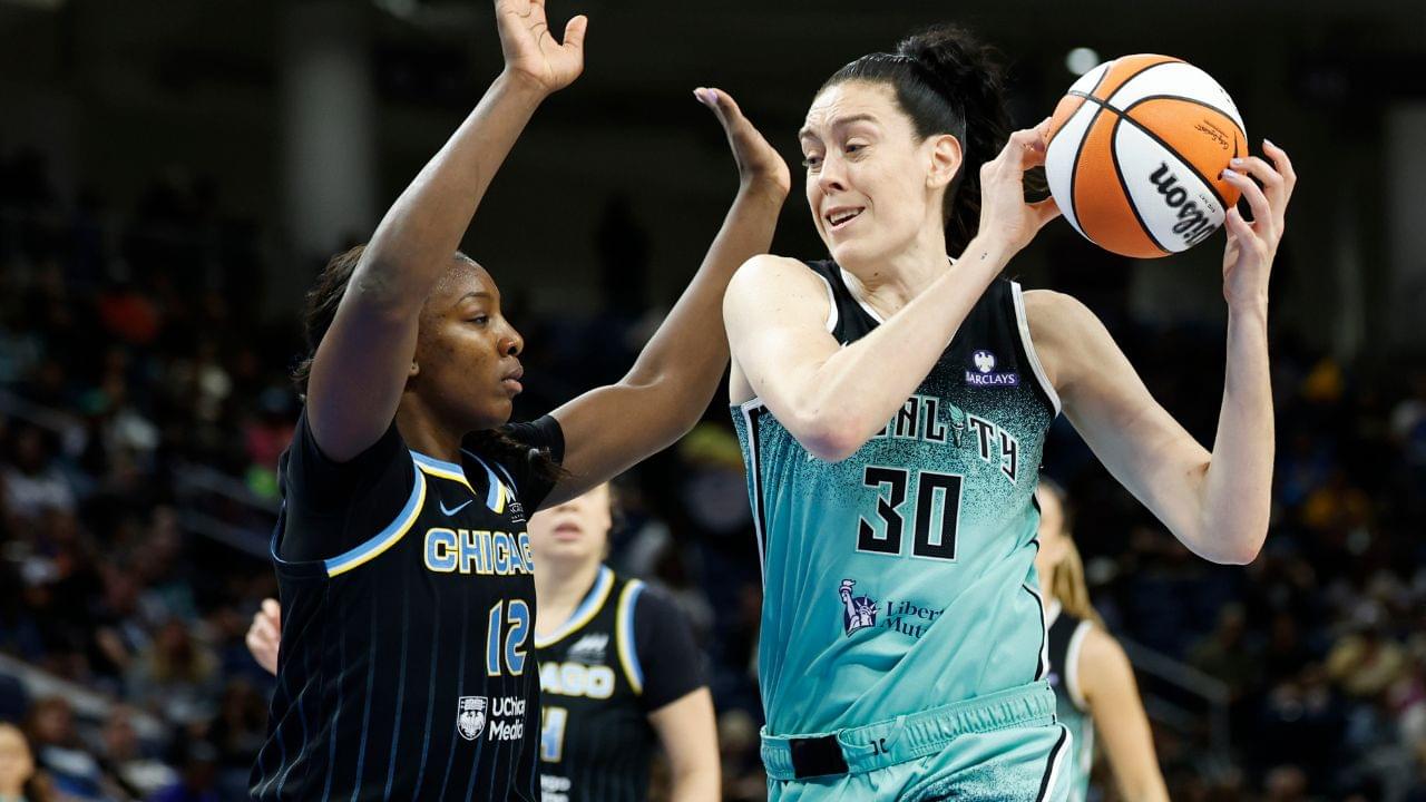 Sep 11, 2025; Chicago, Illinois, USA; New York Liberty forward Breanna Stewart (30) drives to the basket against Chicago Sky forward Michaela Onyenwere (12) during the first half at Wintrust Arena.