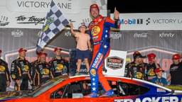 NASCAR Cup Series driver Chase Briscoe (19) and his son Brooks celebrates his win at the Cook Out Southern 500 at Darlington Raceway.