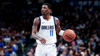 Feb 27, 2025; Dallas, Texas, USA; Dallas Mavericks guard Kyrie Irving (11) controls the ball against the Charlotte Hornets during the second half at American Airlines Center.