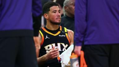 Phoenix Suns guard Devin Booker (1) reacts on the bench against the Oklahoma City Thunder during the second half at Footprint Center.
