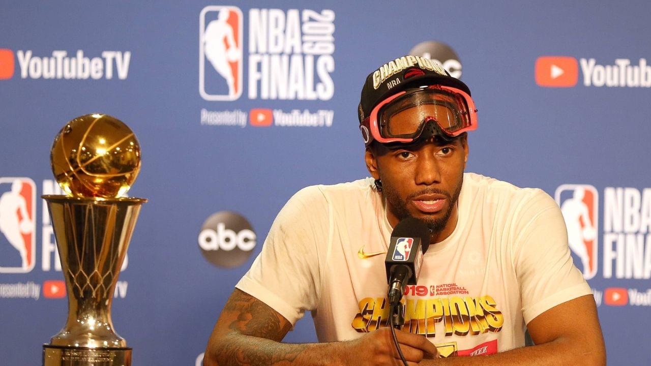 Kawhi Leonard of the Toronto Raptors appears with the Bill Russell NBA,