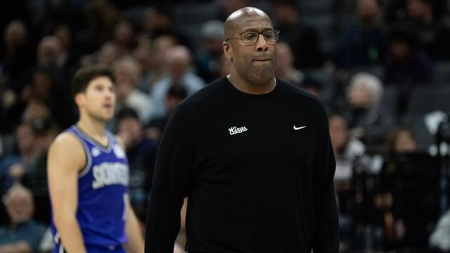 Sacramento Kings coach Mike Brown calls a timeout during NBA
