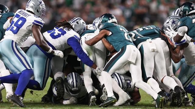 The Philadelphia Eagles execute a tush push for a first down against the Dallas Cowboys during the fourth quarter of the game at Lincoln Financial Field.