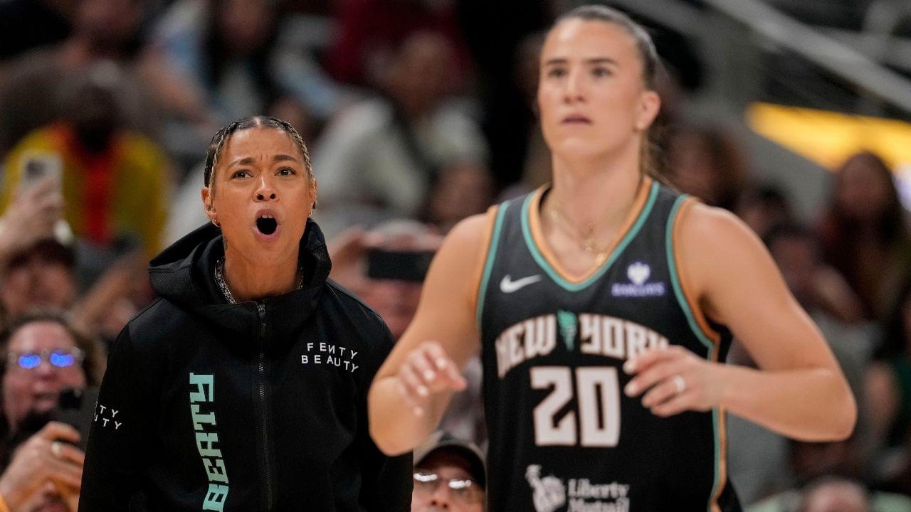 New York Liberty's Natasha Cloud (9) cheers on New York Liberty's Sabrina Ionescu (20) as she competes Friday, July 18, 2025, during the WNBA All-Star 3-point contest at Gainbridge Fieldhouse in Indianapolis.