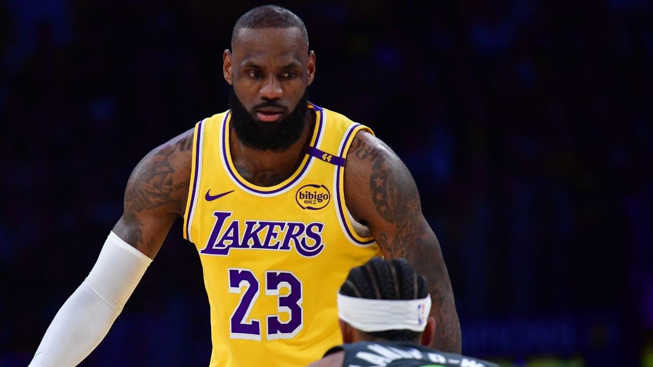 Los Angeles Lakers forward LeBron James (23) controls the ball against Minnesota Timberwolves guard Nickeil Alexander-Walker (9) during the first half in game five of first round for the 2025 NBA Playoffs at Crypto.com Arena.