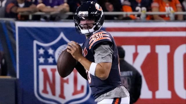 Chicago Bears quarterback Caleb Williams (18) drops back to pass against the Minnesota Vikings during the first half at Soldier Field.