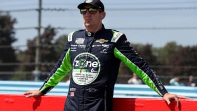 Aug 9, 2025; Watkins Glen, New York, USA; NASCAR Cup Series driver Kyle Busch stands on pit road during practice and qualifying for the Go Bowling at The Glen at Watkins Glen International.