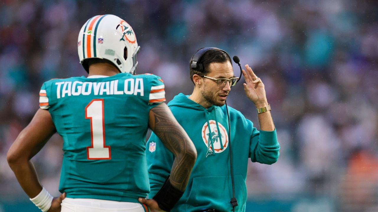 Miami Dolphins head coach Mike McDaniel talks to quarterback Tua Tagovailoa (1) against the Dallas Cowboys during the second quarter at Hard Rock Stadium.