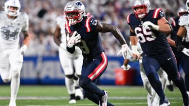 New England Patriots wide receiver Stefon Diggs (8) makes a catch against the Buffalo Bills during the second half at Highmark Stadium.