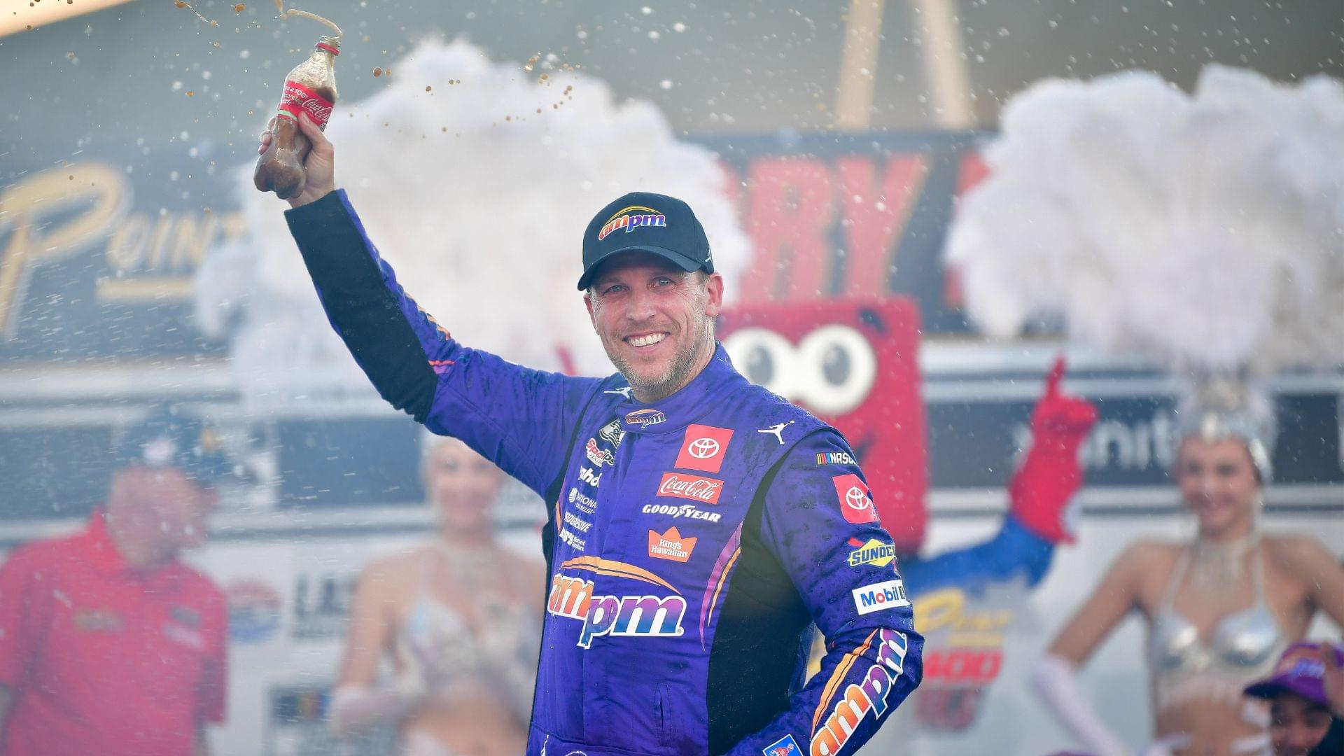 Oct 12, 2025; Las Vegas, Nevada, USA; NASCAR Cup Series driver Denny Hamlin (11) celebrates his victory following the South Point 400 at Las Vegas Motor Speedway.