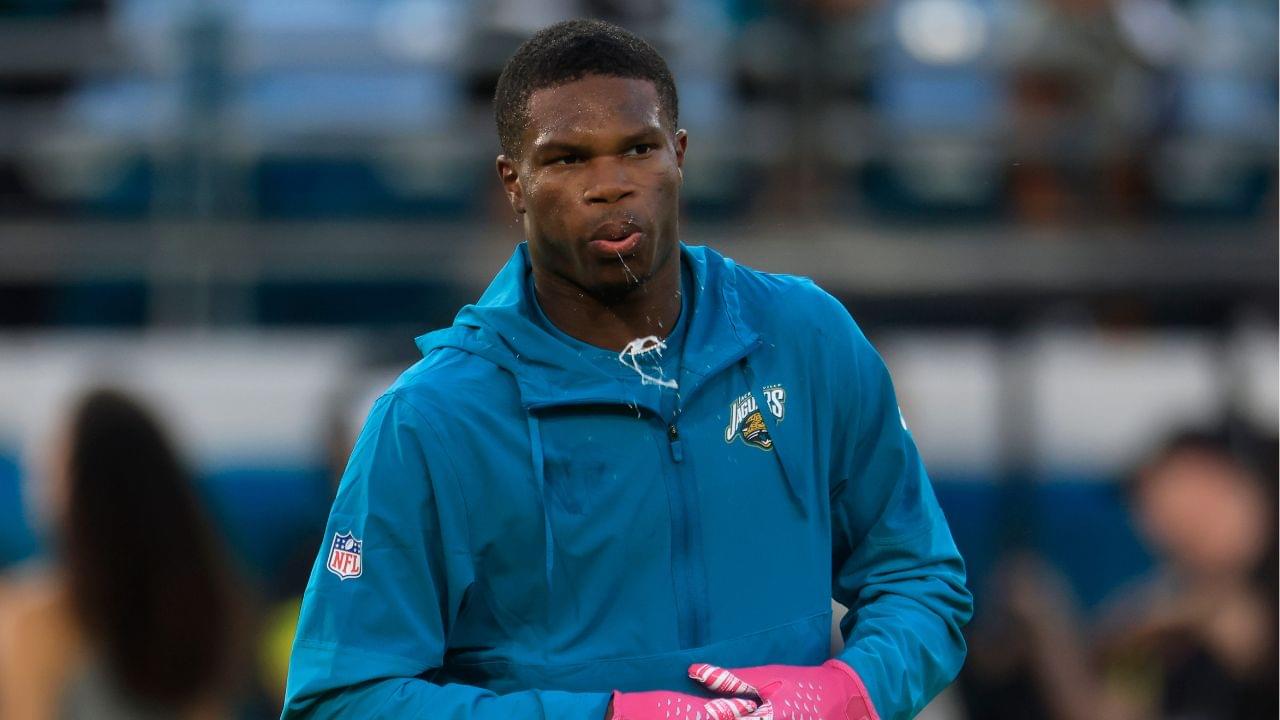 Jacksonville Jaguars wide receiver Travis Hunter (12) spits before an NFL football matchup at EverBank Stadium, Monday, Oct. 6, 2025, in Jacksonville, Fla.